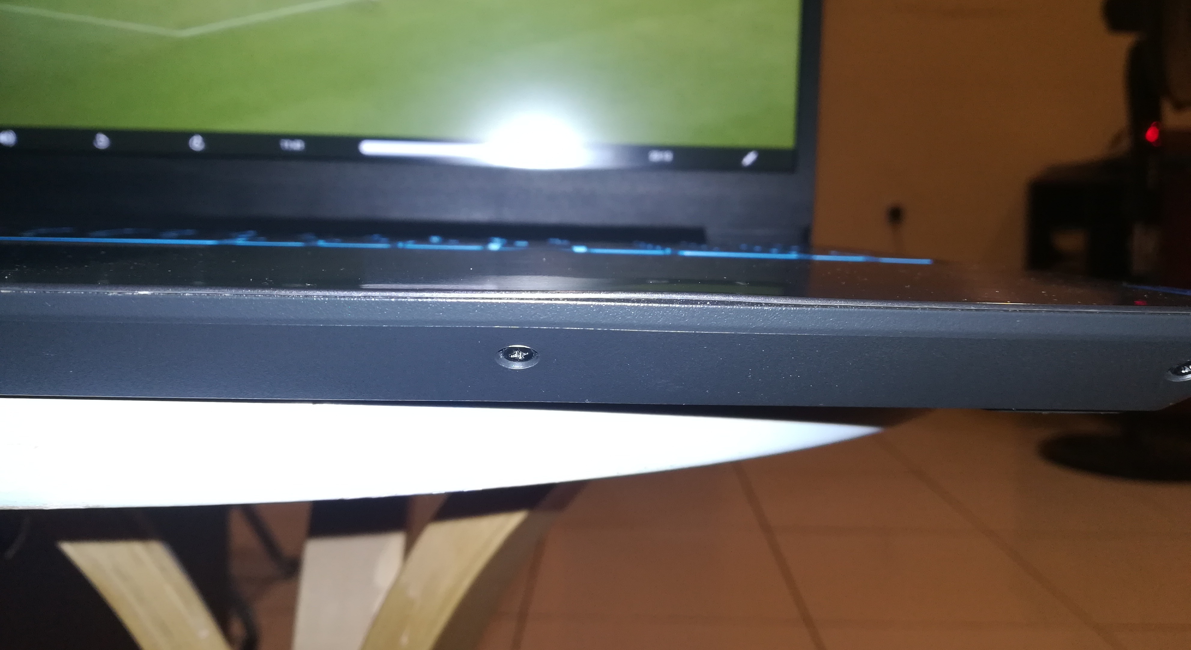 laptop back cover not assembled properly by lenovo services during